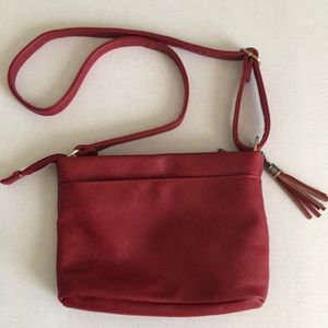 Red cross body purse with A tassel